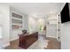 Bright office with hardwood floors, ample shelving, and workspace at 2536 Brookshire Ave, Winter Park, FL 32792
