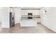 Modern kitchen with stainless steel appliances, granite countertops, and ample cabinet space at 2933 Wild Olive Dr, St Cloud, FL 34772