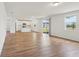 Bright and airy living room with sliding glass doors and modern wood-look flooring at 2933 Wild Olive Dr, St Cloud, FL 34772