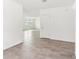Spacious living room featuring neutral tile flooring and lots of natural light at 2933 Wild Olive Dr, St Cloud, FL 34772
