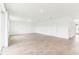 Vast living area with tile flooring, recessed lighting, and a sliding glass door at 2933 Wild Olive Dr, St Cloud, FL 34772
