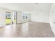 Bright living room with tile flooring and sliding glass doors to the backyard at 2933 Wild Olive Dr, St Cloud, FL 34772