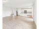 Open floor plan with living area and kitchen, tile floors, and plenty of natural light at 2933 Wild Olive Dr, St Cloud, FL 34772