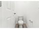 Powder room featuring a standard white toilet at 2933 Wild Olive Dr, St Cloud, FL 34772