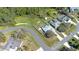 Aerial view showcases the property's layout, including the pool, and ample backyard at 3275 Deer Lick Ct, Kissimmee, FL 34746