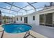 Enjoy this beautiful in-ground pool with screen enclosure and ample patio space at 3275 Deer Lick Ct, Kissimmee, FL 34746