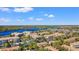 Wide aerial view of the residential community, showcasing its multiple buildings and lush green landscaping at 3332 Robert Trent Jones Dr # 20703, Orlando, FL 32835