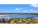 Stunning aerial view of a lakeside community with beautiful landscaping and clear blue skies at 3332 Robert Trent Jones Dr # 20703, Orlando, FL 32835