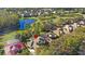 Aerial view of house and surrounding area, including the nearby pond at 3352 Park Grove Ct, Longwood, FL 32779