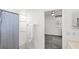 Bathroom with a shower/tub combination and a view into an adjacent bedroom at 3352 Park Grove Ct, Longwood, FL 32779