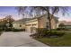 Well-maintained home featuring a side-entry garage, manicured landscaping, and a serene setting at 3352 Park Grove Ct, Longwood, FL 32779