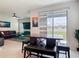 Cozy breakfast nook with a table and seating for four, leading to a sliding glass door and backyard views at 338 Crestwind Dr, Daytona Beach, FL 32124