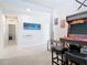 Fun game room with arcade, keyboard, and stools. Great for entertaining friends and Gathering at 338 Crestwind Dr, Daytona Beach, FL 32124