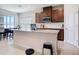 Stylish kitchen island with granite countertops and stainless steel appliances, perfect for cooking at 338 Crestwind Dr, Daytona Beach, FL 32124