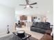 Modern living room featuring an open floor plan and seamless flow into the kitchen at 338 Crestwind Dr, Daytona Beach, FL 32124