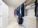 Spacious walk-in closet with ample shelving and storage, perfect for organization and wardrobe display at 338 Crestwind Dr, Daytona Beach, FL 32124