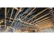 Damaged ceiling interior view showcasing exposed wood beams, charred surfaces, and necessary repairs at 4421 Steed Ter, Winter Park, FL 32792