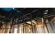 Charred beams and damaged wooden frame indicate extensive fire damage inside this residential property at 4421 Steed Ter, Winter Park, FL 32792