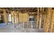 Open-concept home interior featuring exposed framing, offering a glimpse of its layout and potential at 4421 Steed Ter, Winter Park, FL 32792