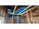 Exposed ceiling framing with damaged insulation and blue tarp covering at 4421 Steed Ter, Winter Park, FL 32792