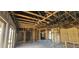 Unfinished interior with exposed ceiling and framing, showcasing potential for customization at 4421 Steed Ter, Winter Park, FL 32792