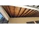 Covered patio with a rustic wooden ceiling, offering a shaded retreat for outdoor gatherings and leisure at 4421 Steed Ter, Winter Park, FL 32792