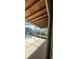 Screened-in patio with a view of the refreshing pool, perfect for outdoor relaxation and entertainment at 4421 Steed Ter, Winter Park, FL 32792