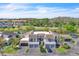 Aerial view of townhomes with private garages, driveways, and well-kept landscaping at 5122 Cypress Creek Dr # 103, Orlando, FL 32811