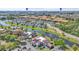 Aerial view of community near I-Drive and Universal Studios with ponds and lush greenery at 5122 Cypress Creek Dr # 103, Orlando, FL 32811