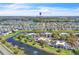 Expansive aerial view of community with ponds near Downtown Orlando at 5122 Cypress Creek Dr # 103, Orlando, FL 32811