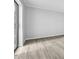 Bedroom with neutral paint color and wood look flooring at 5122 Cypress Creek Dr # 103, Orlando, FL 32811