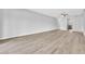 Bright and airy living room featuring updated flooring and ample natural light at 5122 Cypress Creek Dr # 103, Orlando, FL 32811