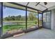 Enclosed patio boasting lake view at 5122 Cypress Creek Dr # 103, Orlando, FL 32811