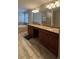 Bathroom boasting a soaking tub, walk-in shower, granite countertops, and tile floors at 5520 Solterra Cir, Davenport, FL 33837