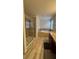 Bathroom boasting a glass enclosed shower, soaking tub, and granite countertops at 5520 Solterra Cir, Davenport, FL 33837