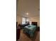 Bedroom featuring two beds with carpet flooring and a window providing natural light at 5520 Solterra Cir, Davenport, FL 33837