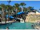 Enjoy the community pool with a twisting water slide for hours of Gathering fun in the sun at 5520 Solterra Cir, Davenport, FL 33837
