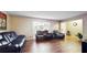 Comfortable living room with hardwood floors and plenty of seating at 650 N 4Th Ave, Deltona, FL 32725