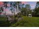 Picturesque backyard with a gazebo and boat access, perfect for enjoying waterfront living and outdoor activities at 703 Valencia Shores Dr, Winter Garden, FL 34787