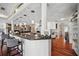 Spacious kitchen with bar seating, granite countertops and white cabinetry at 703 Valencia Shores Dr, Winter Garden, FL 34787