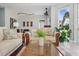 Cozy living room with comfortable seating, natural light, and stylish decor elements at 703 Valencia Shores Dr, Winter Garden, FL 34787