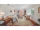Cozy living room featuring hardwood floors, and vintage decor at 703 Valencia Shores Dr, Winter Garden, FL 34787