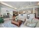 Open living space with great lighting, open kitchen view, and comfortable seating arrangement at 703 Valencia Shores Dr, Winter Garden, FL 34787