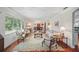 Bright living room with decorative ceiling, hardwood floors, and elegant furnishings at 703 Valencia Shores Dr, Winter Garden, FL 34787
