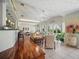 Bright living room with tiled floors, ample natural light, and an open floor plan at 703 Valencia Shores Dr, Winter Garden, FL 34787
