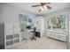Bright office with tile floor, natural light, and white storage units at 703 Valencia Shores Dr, Winter Garden, FL 34787