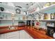 Well-organized pantry with stainless steel appliances, wood counters, and ample storage at 703 Valencia Shores Dr, Winter Garden, FL 34787