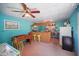 Eclectic recreation room with foosball table, bar area, and colorful decor at 703 Valencia Shores Dr, Winter Garden, FL 34787