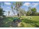 Serene yard featuring a charming gazebo, perfect for peaceful relaxation and enjoying the natural surroundings at 703 Valencia Shores Dr, Winter Garden, FL 34787