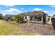 A spacious screened-in lanai and patio extends from this house into a beautifully landscaped yard at 7928 Hanson Bay Pl, Kissimmee, FL 34747